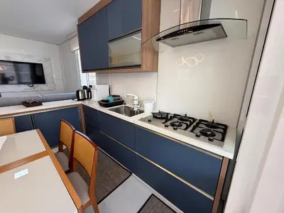 A cozinha ou kitchenette de Cód 189 - Apartamento completo à 100 m da praia
