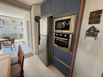 A cozinha ou kitchenette de Cód 189 - Apartamento completo à 100 m da praia