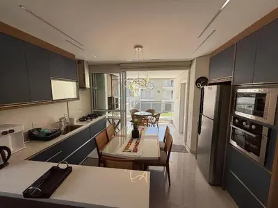 A cozinha ou kitchenette de Cód 189 - Apartamento completo à 100 m da praia