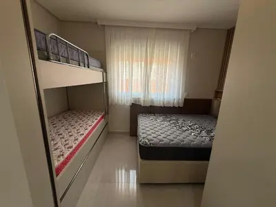 Uma cama ou camas num quarto em Cód 189 - Apartamento completo à 100 m da praia