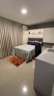 Uma cama ou camas num quarto em Apartamento aconchegante praia de palmas