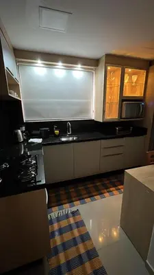 A cozinha ou kitchenette de Apartamento aconchegante praia de palmas