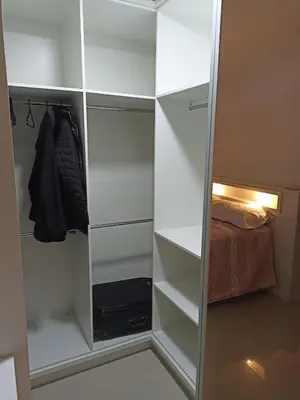 Uma cama ou camas num quarto em Apartamento, Temporada Itapema sc