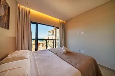 A planta de Canto da Amoreira 203 - Apartamento Duplex - Vista para o Mar - Canto Grande - Bombinhas