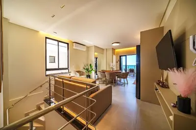 A planta de Canto da Amoreira 203 - Apartamento Duplex - Vista para o Mar - Canto Grande - Bombinhas