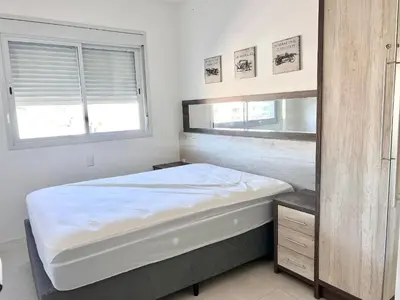 Uma cama ou camas num quarto em Lindo! Apto com piscina no condomínio - AE03J