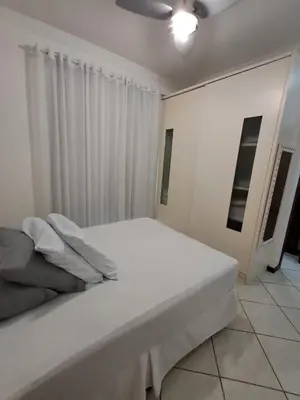 Uma cama ou camas num quarto em Apto 3 Suítes Quadra Mar Itapema SC