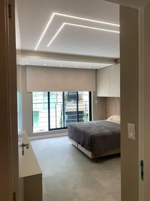 Uma cama ou camas num quarto em Triplex 3850