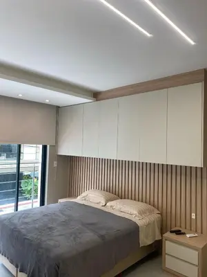 Uma cama ou camas num quarto em Triplex 3850