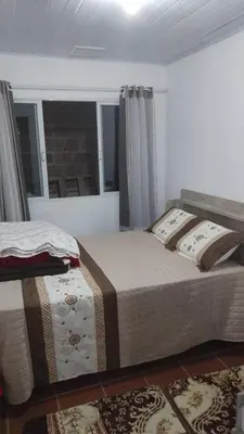 Uma cama ou camas num quarto em Alberto