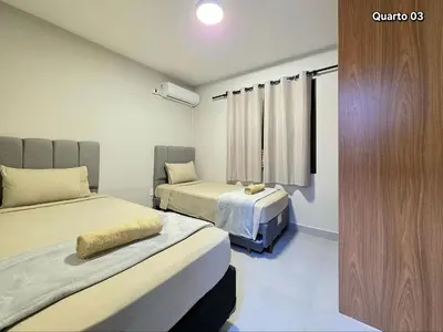 Uma cama ou camas num quarto em Cobertura com 4 quartos quadra do Mar Meia Praia