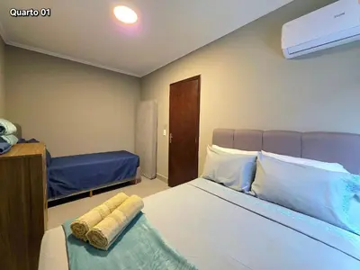 Uma cama ou camas num quarto em Apt Novo a poucos passos do mar em Meia Praia