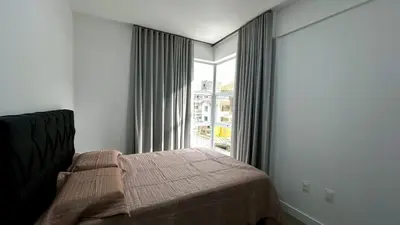 Uma cama ou camas num quarto em Apto Da Praia 201