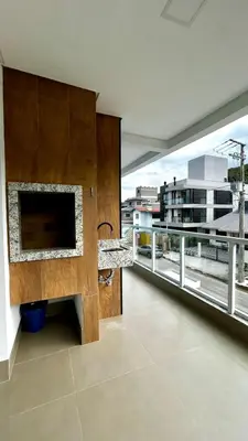 Uma televisão e/ou sistema de entretenimento em Apto Da Praia 201