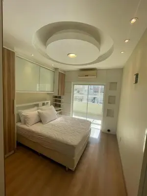Uma cama ou camas num quarto em Apto de 2 Quartos em Meia Praia