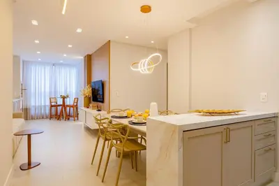 A cozinha ou kitchenette de Belissimo apto alto padrão a 50 mts da praia