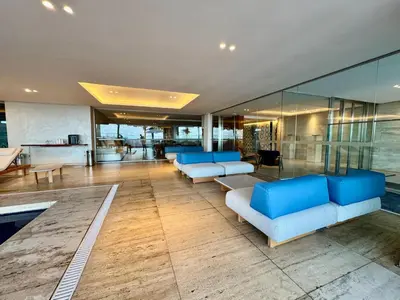 Uma área de estar em Apartamento Beira Mar