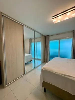 Uma cama ou camas num quarto em Apartamento Beira Mar