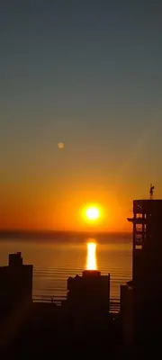 O nascer ou o pôr do sol visto a partir do apartamento