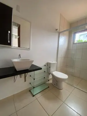 Uma casa de banho em Casa com Piscina em Bombinhas