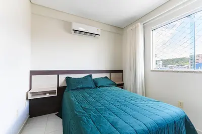 Uma cama ou camas num quarto em Res. Wilian 308 - Apto 2 quartos em Bombas