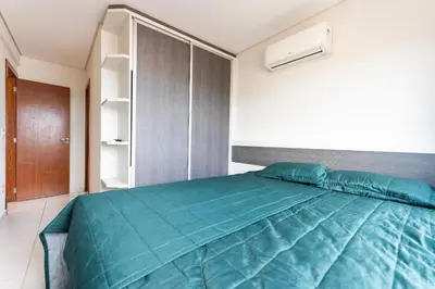 Uma cama ou camas num quarto em Res. Wilian 308 - Apto 2 quartos em Bombas