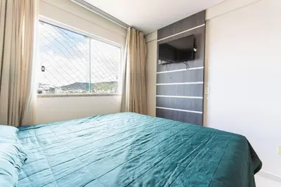 Uma cama ou camas num quarto em Res. Wilian 308 - Apto 2 quartos em Bombas