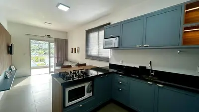 A cozinha ou kitchenette de apto dapraia 401