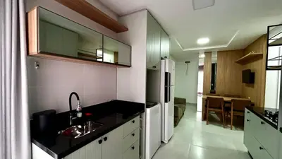 A cozinha ou kitchenette de apartamento praia de Palmas angel 202