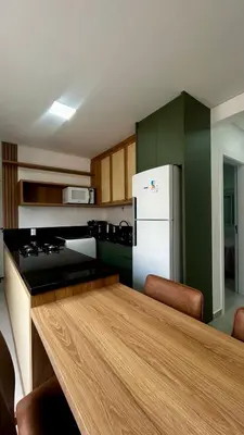 A cozinha ou kitchenette de apartamento praia de Palmas angel 303