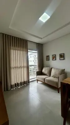 Uma área de estar em apartamento praia de Palmas angel 303