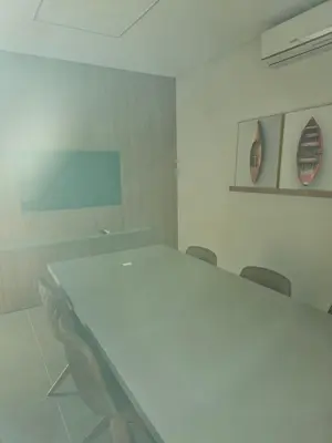 A área empresarial e/ ou a sala de conferências de Suite privada en Four Seasons Residence monoambiente