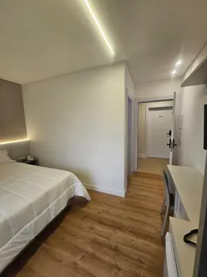 Uma cama ou camas num quarto em Suite privada en Four Seasons Residence monoambiente