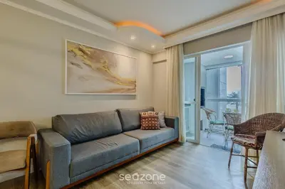 Uma área de estar em Apartamentos a 100m da Praia em BC - ERM