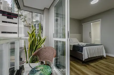 Uma cama ou camas num quarto em Apartamentos a 100m da Praia em BC - ERM