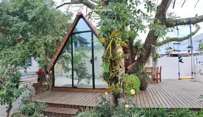 Um jardim no exterior de Chalé Ecológico para 2 pessoas