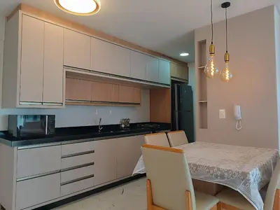 A cozinha ou kitchenette de Apto novo com vista pro mar