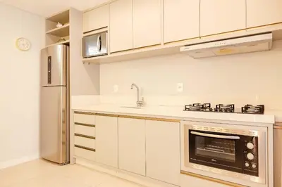 A cozinha ou kitchenette de Aconchegante Apto em Condominio com Piscina