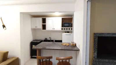 A cozinha ou kitchenette de Apartamento no coração da praia de Bombas