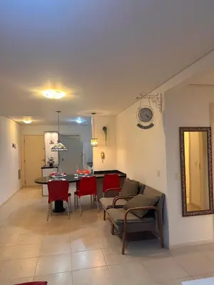 Uma área de estar em Apartamento na praia de Palmas