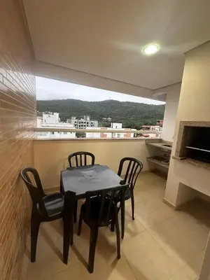 Uma varanda ou terraço em Apartamento na praia de Palmas