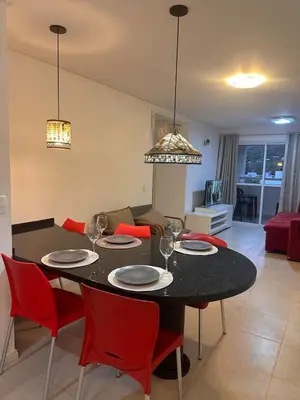 Uma área de estar em Apartamento na praia de Palmas