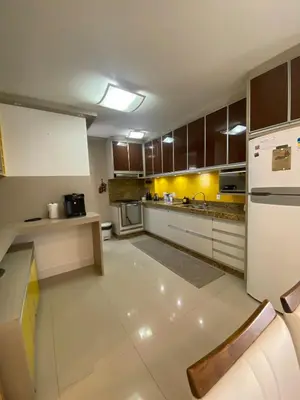 A cozinha ou kitchenette de Apartamento aconchegante a 100 metros da praia!