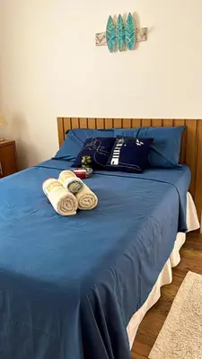Uma cama ou camas num quarto em Quarto em casa compartilhada - aqui vc vai se sentir em casa