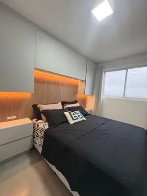 Uma cama ou camas num quarto em Apto de 1 quarto em itapema