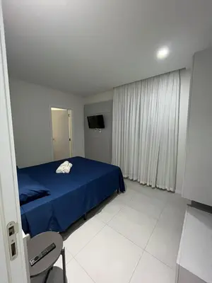 Uma cama ou camas num quarto em Apto a 200mts do mar Meia Praia - Itapema
