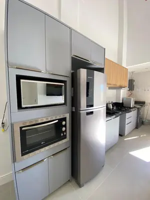 A cozinha ou kitchenette de Garden duplex - 130m da praia