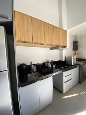A cozinha ou kitchenette de Garden duplex - 130m da praia