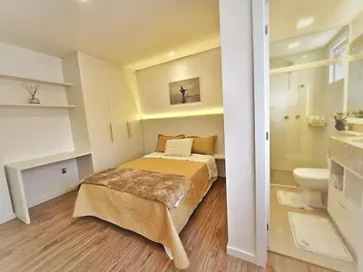 Uma cama ou camas num quarto em 504 - Apartamento Novo à 300 metros do mar em Itapema