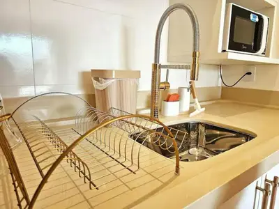 A cozinha ou kitchenette de 504 - Apartamento Novo à 300 metros do mar em Itapema